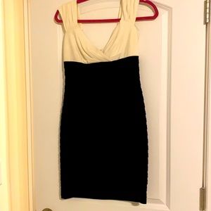 Black and cream cocktail dress. Worn twice. Great wedding guest dress.
